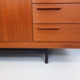 High Scandinavian modernist vintage sideboard in teak and black metal.