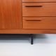 High Scandinavian modernist vintage sideboard in teak and black metal.