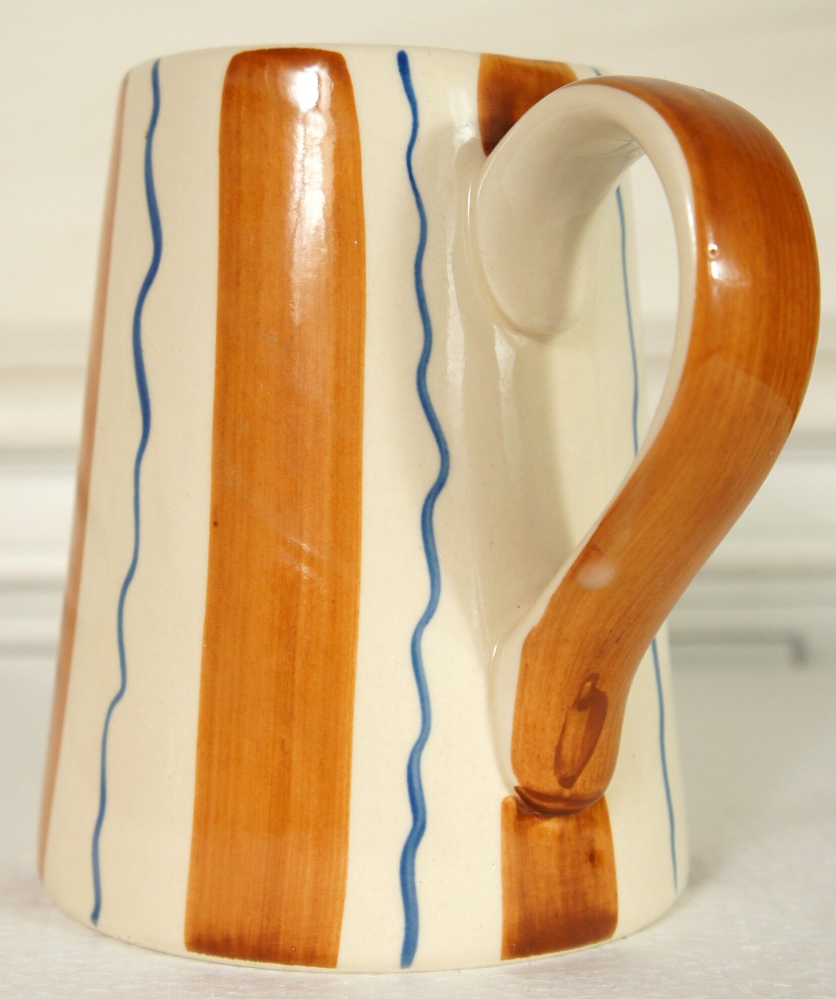 Painted ceramic pitcher
