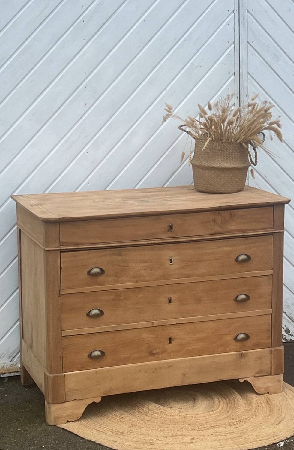 Antique chest of drawers with a chic country feel