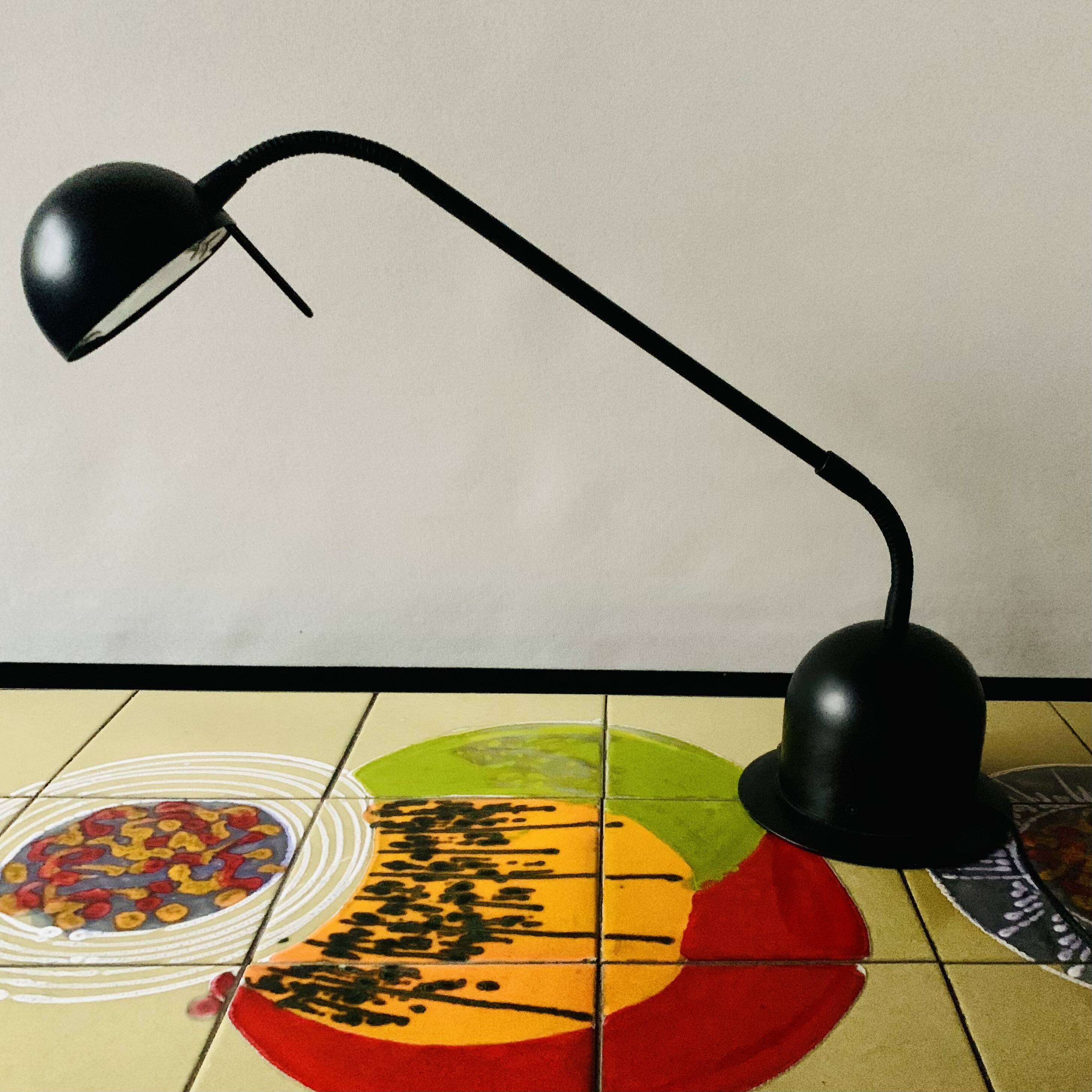 Massive vintage desk lamp in black metal