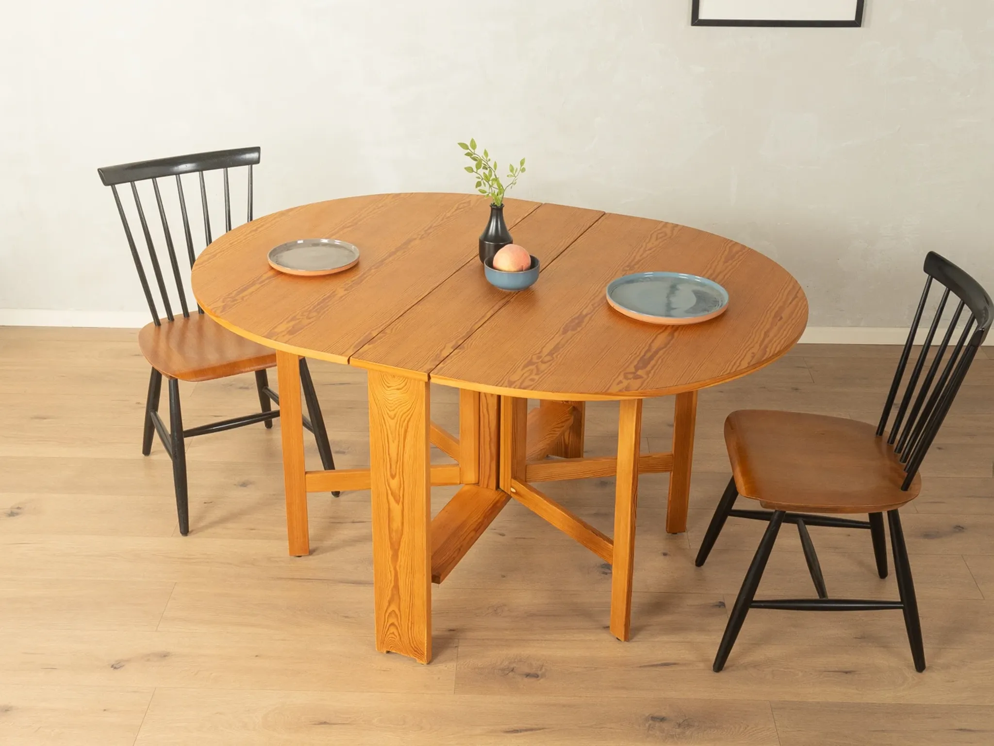 Practical folding table from the 1980s made of light brown pine wood