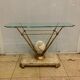 Travertine console from Fournier Paris over glass