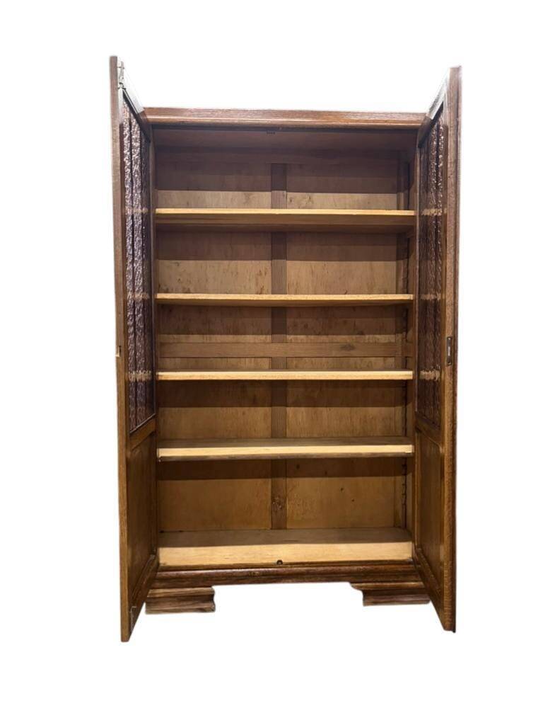 Vintage wooden display cabinet with textured glass.
