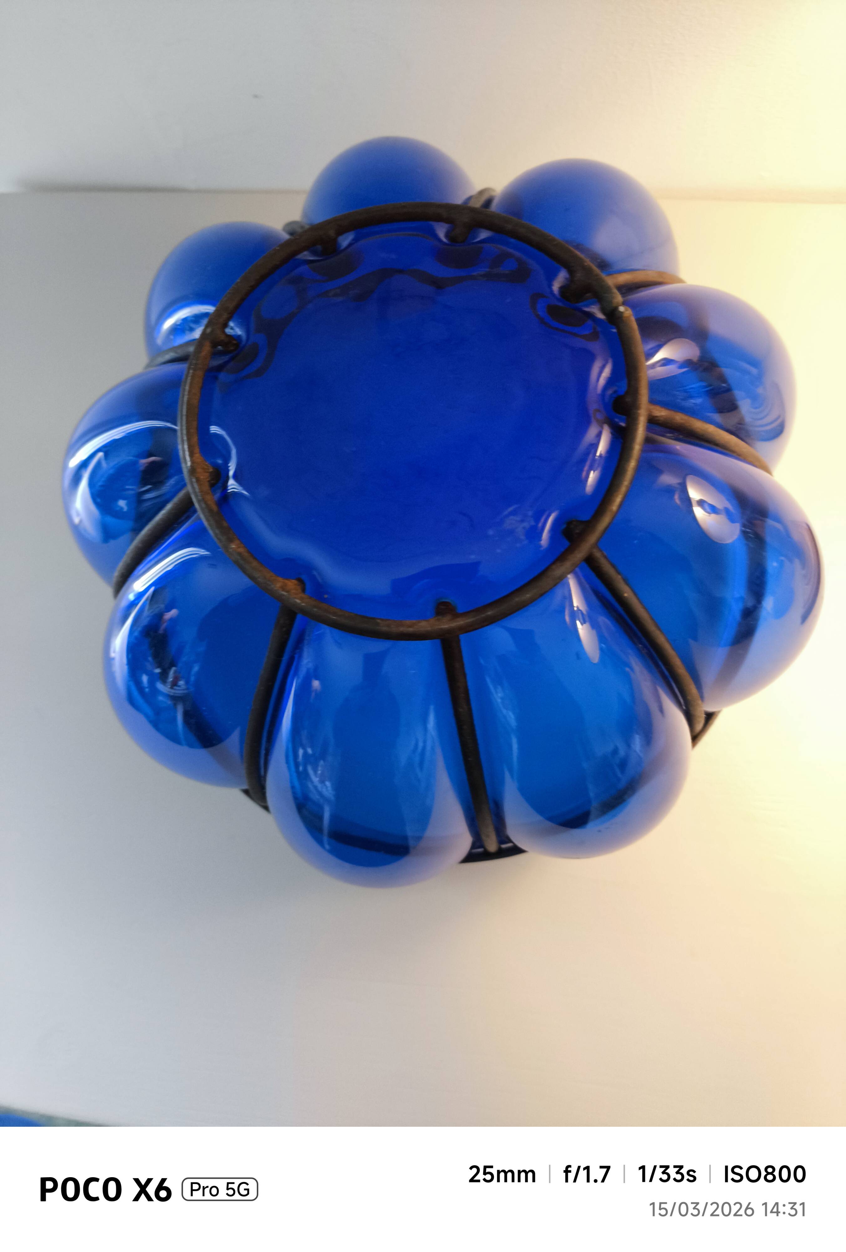 Superb vintage blown glass bowl in cobalt blue with its iron frame.