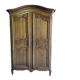 Norman Cauchoise wardrobe in medium oak, carved from the 19th century with a gendarme hat top.