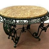 Round living room table in wrought iron and marble XX century