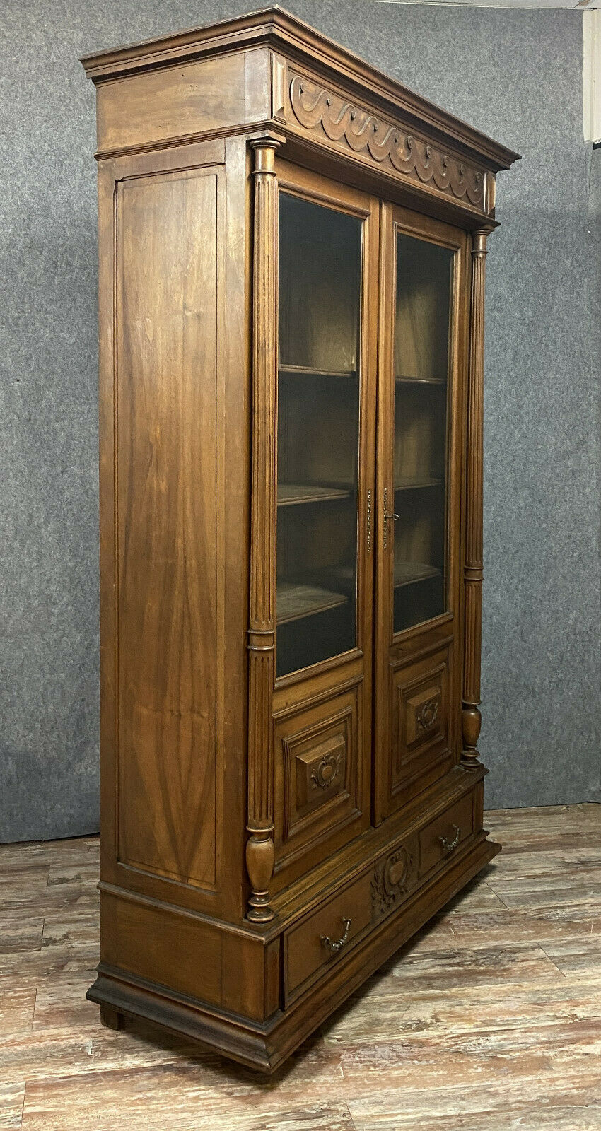 Gothic Renaissance library in solid walnut with columns around 1850