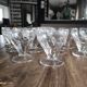 Lot de 11 coupes à champagne en verre ancien ciselé décor floral sur pied bas