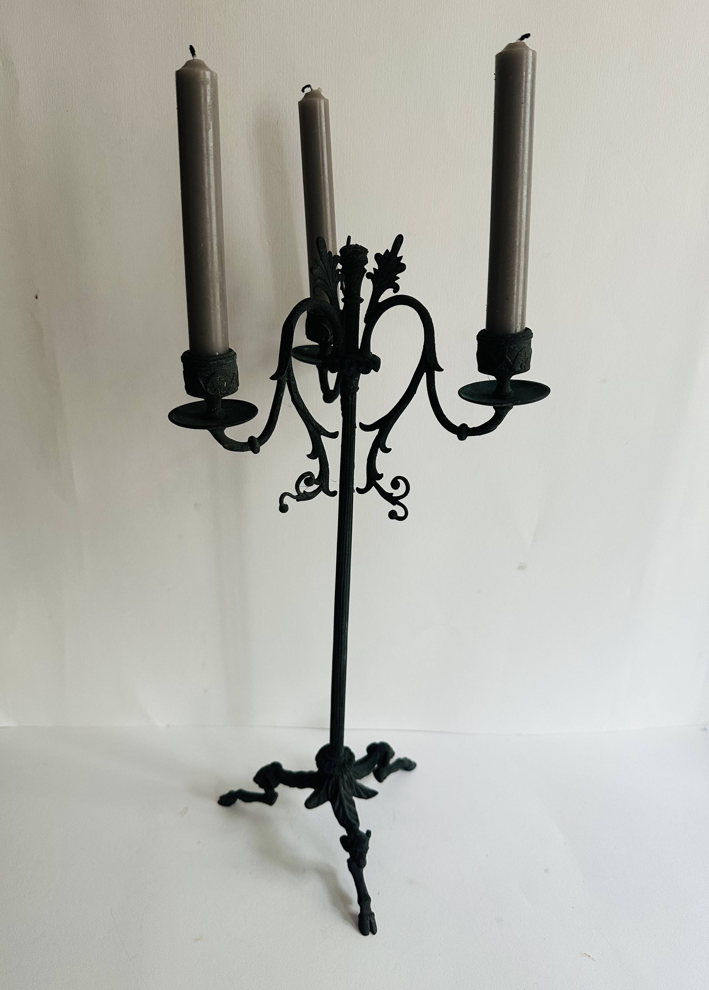 Pair of large Napoleon III candlesticks in patinated bronze