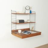 Original String shelf by Nils Strinning in teak veneer, 1949