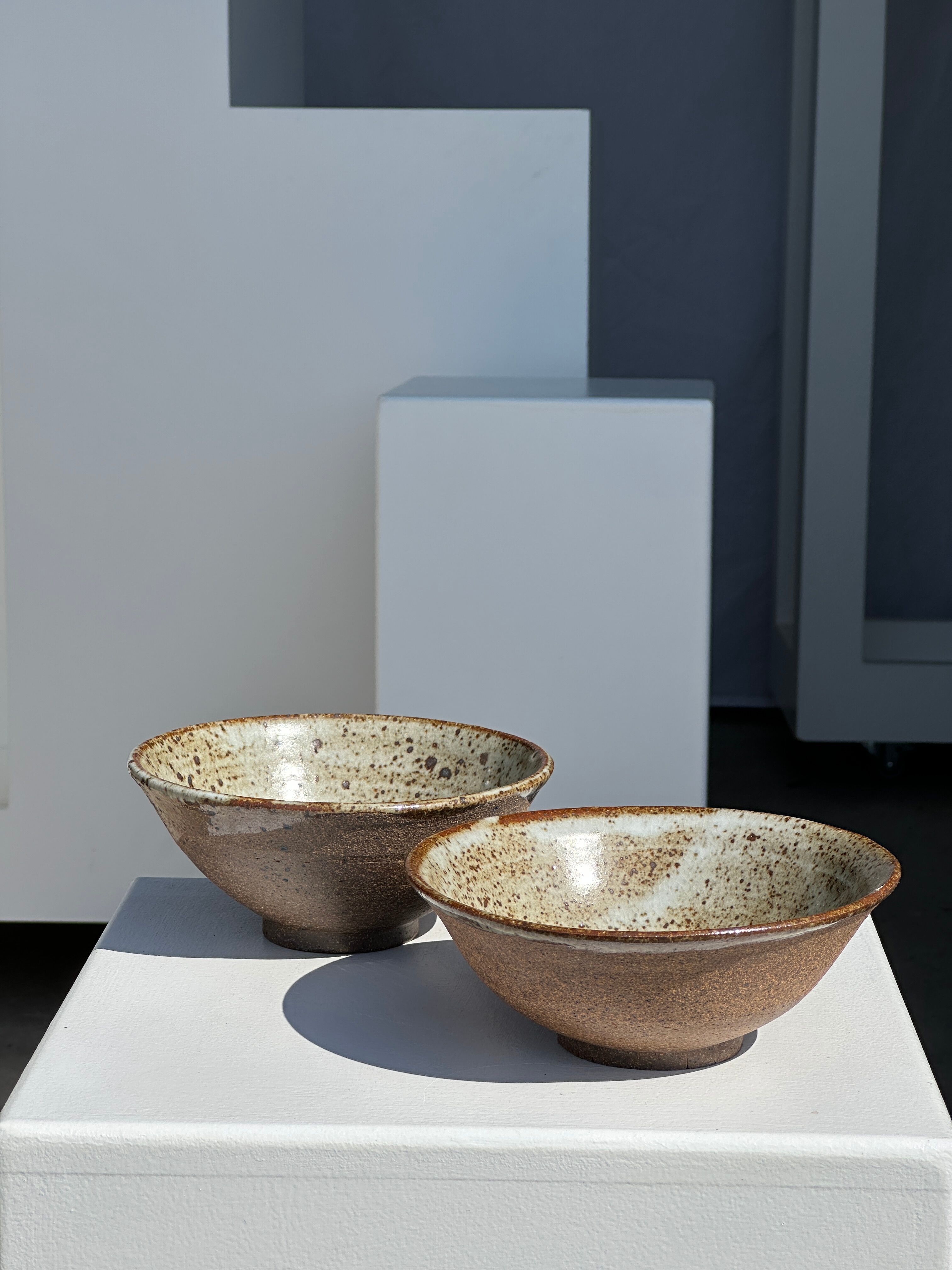 Duo of ceramic bowls interior glazed exterior matt raw earth