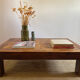 Solid wood coffee table with marquetry top