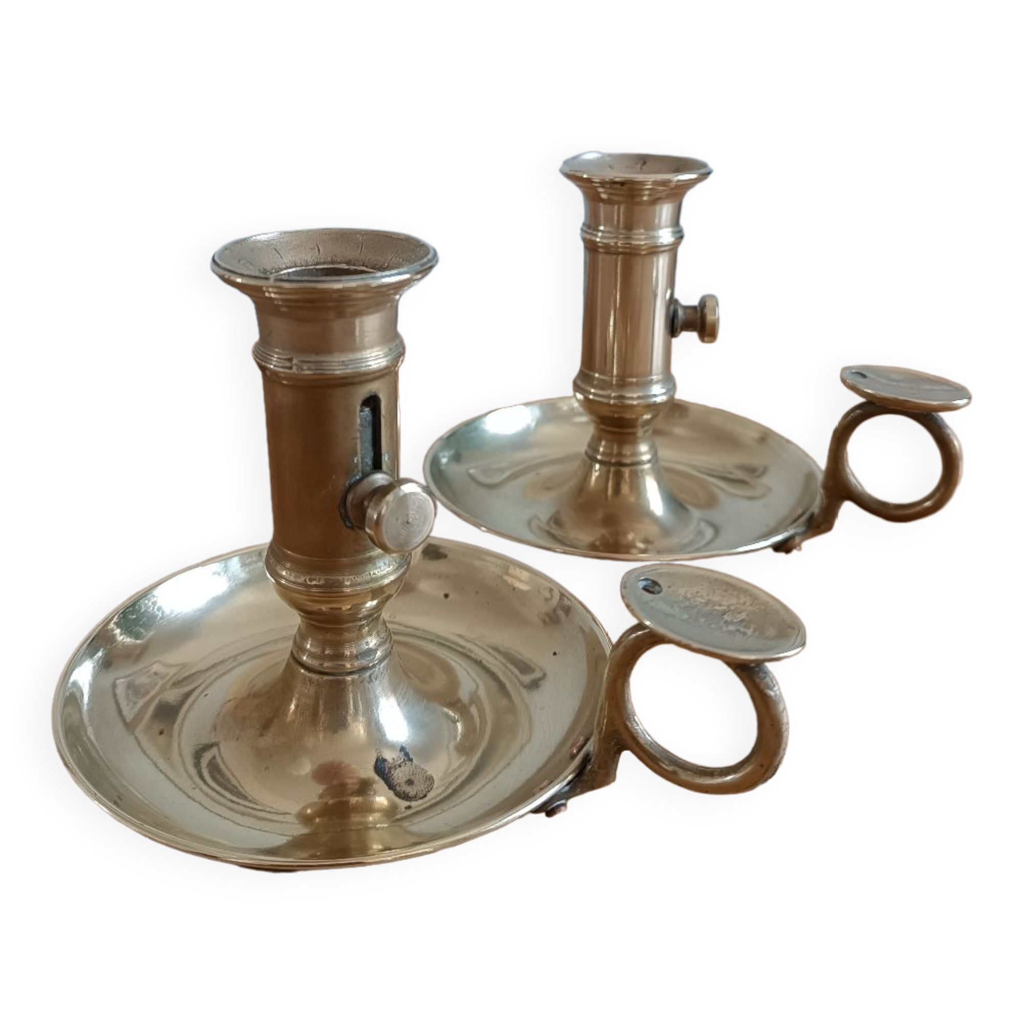 Duo of gilded brass cellar rat candlesticks