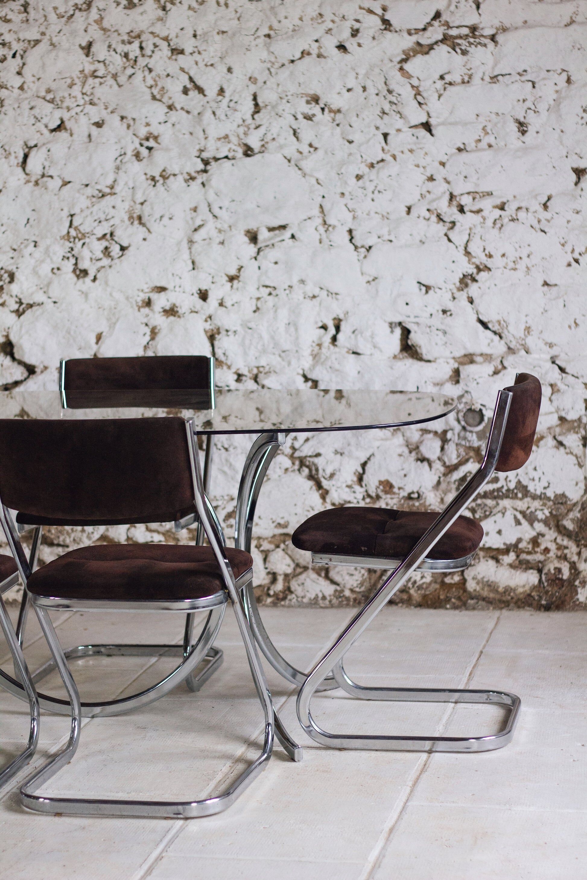 Chrome and smoked glass dining table in the style of Gastone Rinaldi, 1970.