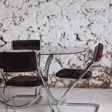 Chrome and smoked glass dining table in the style of Gastone Rinaldi, 1970.