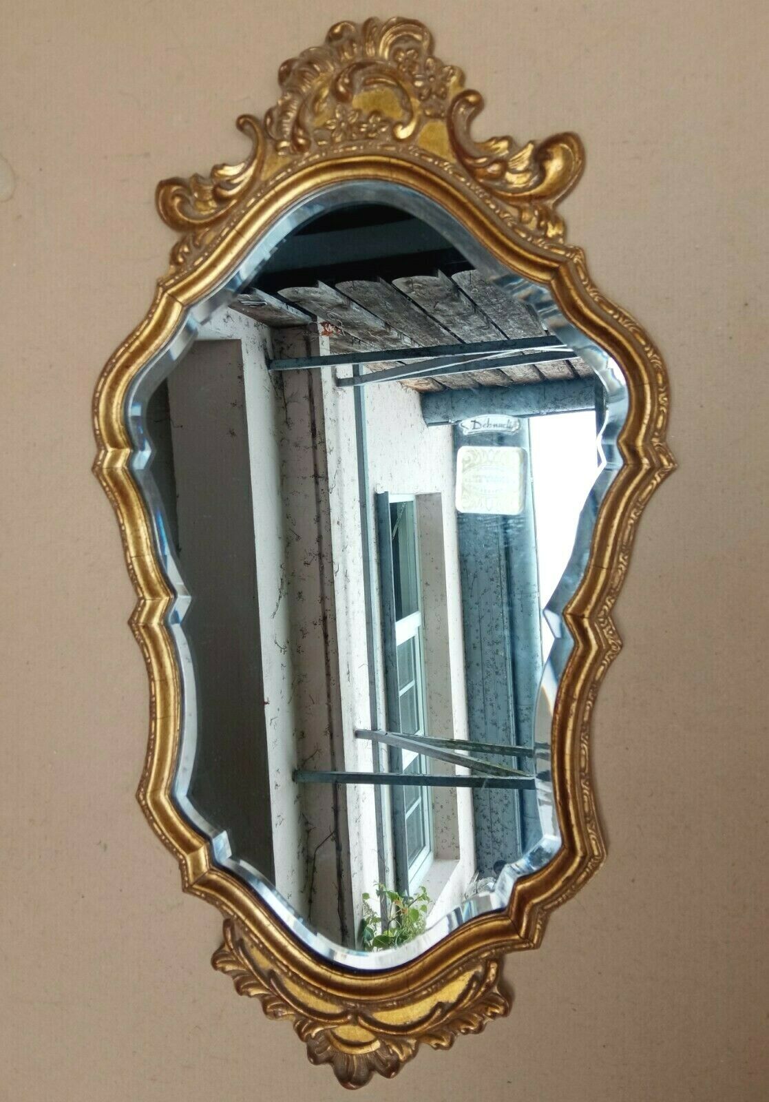 Golden wall mirror with gold leaf Deknudt - beveled ice - Louis XV style