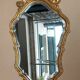 Golden wall mirror with gold leaf Deknudt - beveled ice - Louis XV style