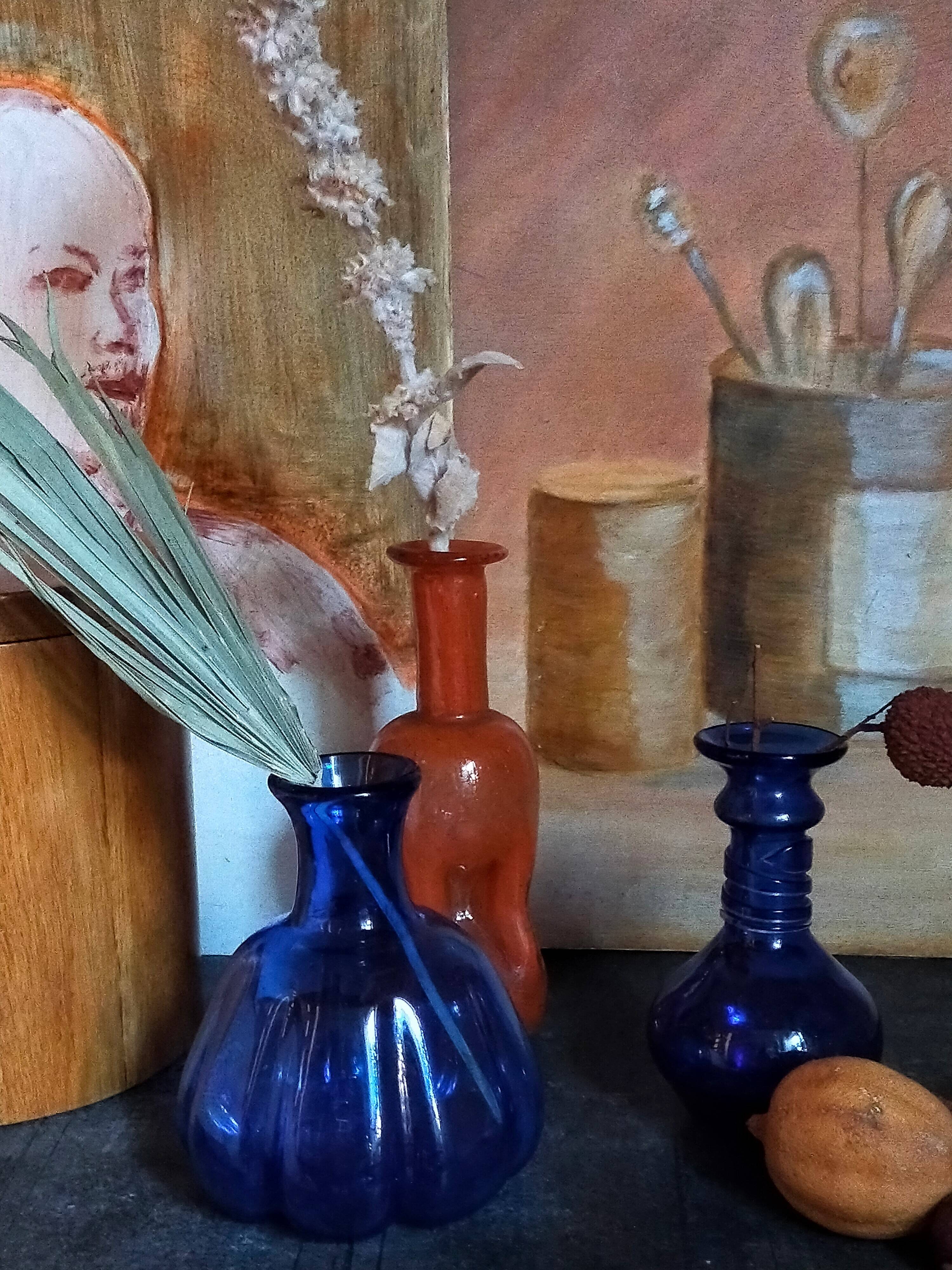 Trio of vintage blown glass soliflore vases