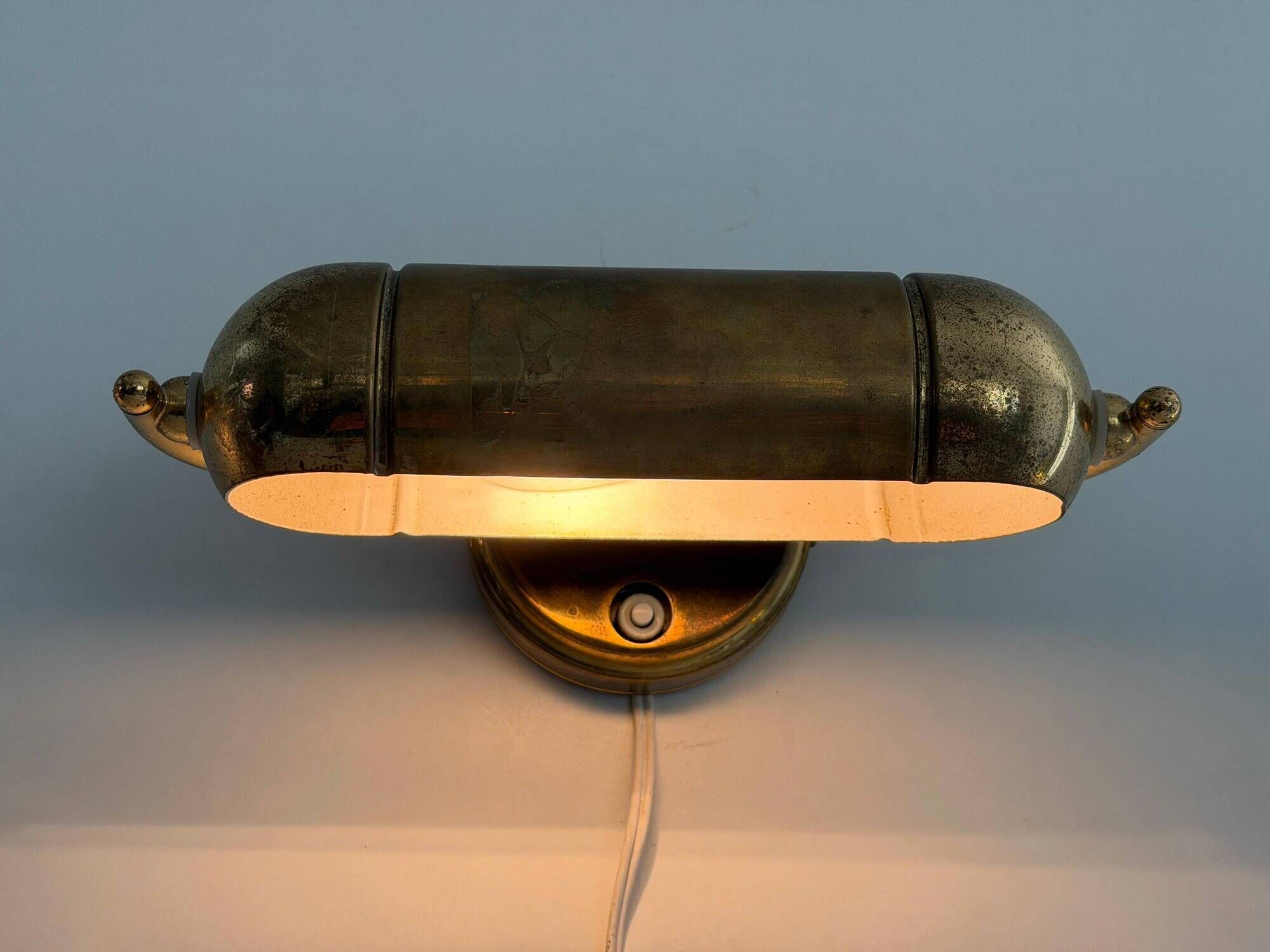 Pair of brass wall lights from the mid-century by N Leuchten, 1960s, Germany.