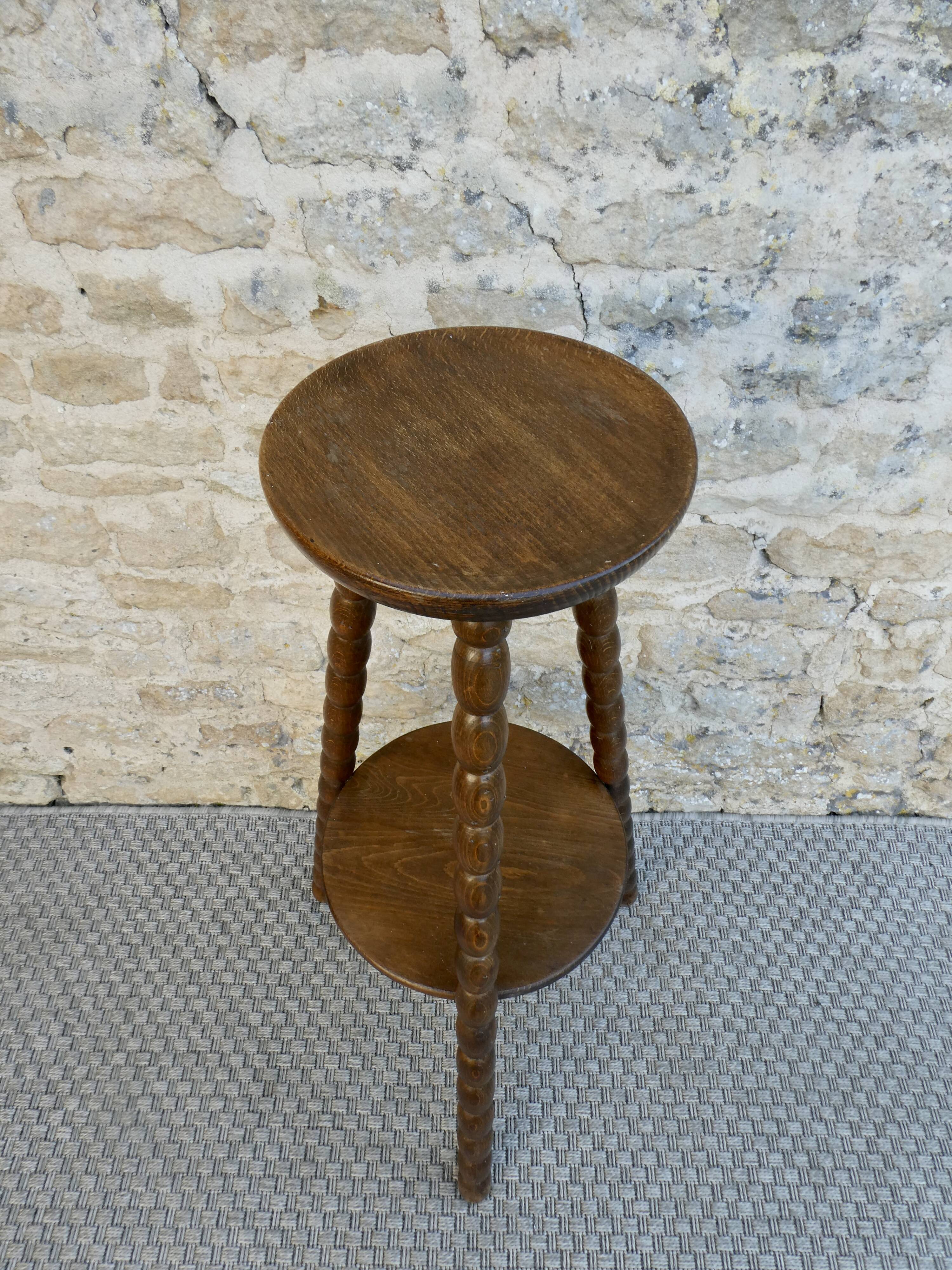 Turned wooden tripod stand