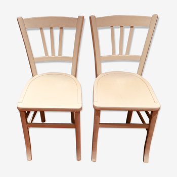 Paire de chaises bistrot vintage peinte en blanc