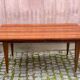 Scandinavian extendable dining table in lacquered wood and rosewood, 150cm.