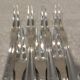 7 silver-plated metal snail forks by silversmith Alfenide, Paris pattern