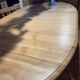 Table ovale en merisier naturel