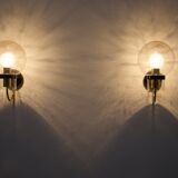 Wall lights with blown glass globes.