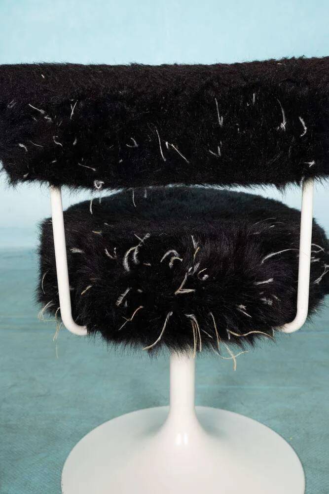 Space age design armchair from the sixties, fluffy stool with trumpet base.