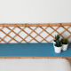 Blue rattan shelf