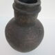 Black African pottery with stylized giraffe pattern
