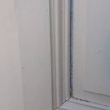 Pair of cupboard doors and old woodwork frame