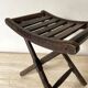 Folding slatted wooden stool