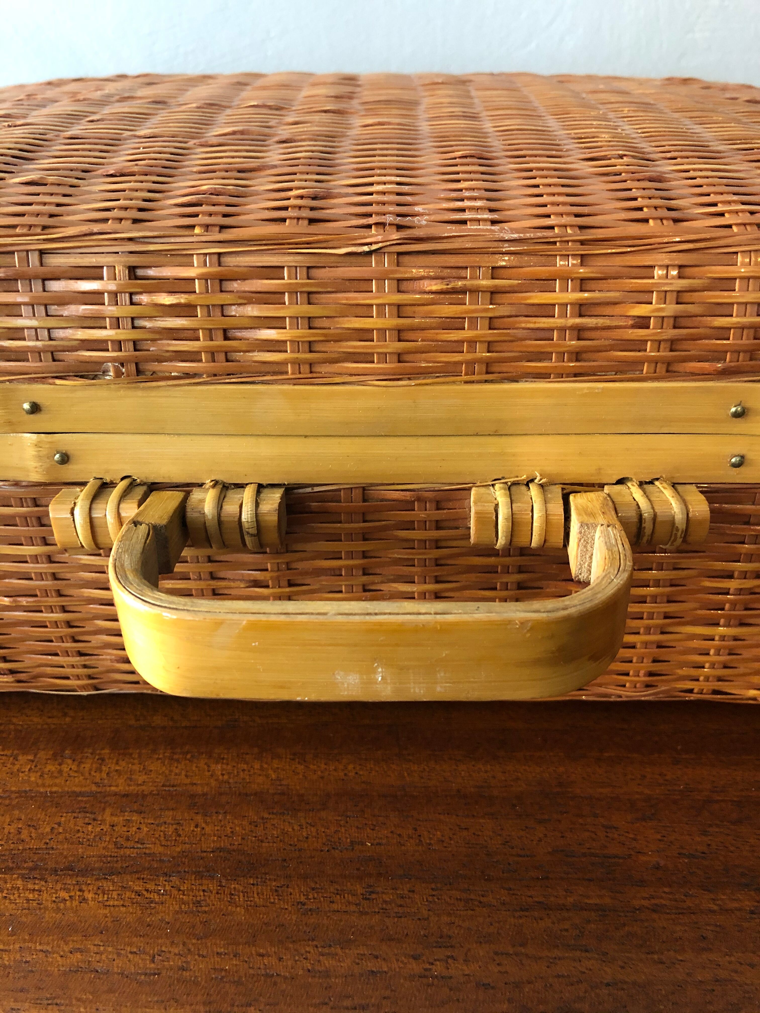 Vintage braided wicker suitcase