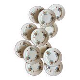 Set of 12 old flat plates with flower decorations - Salins