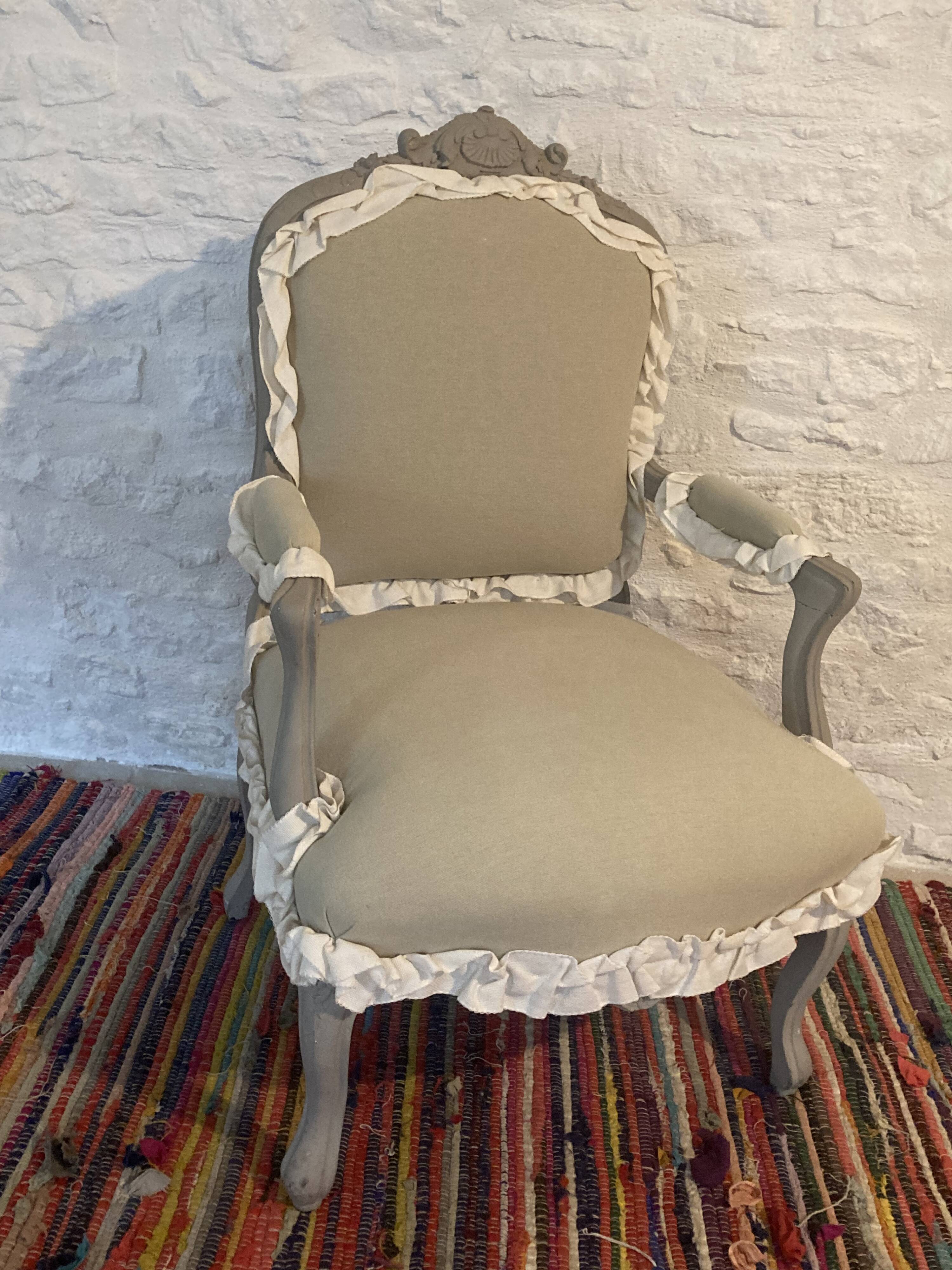Frilly Regency style bergère armchair