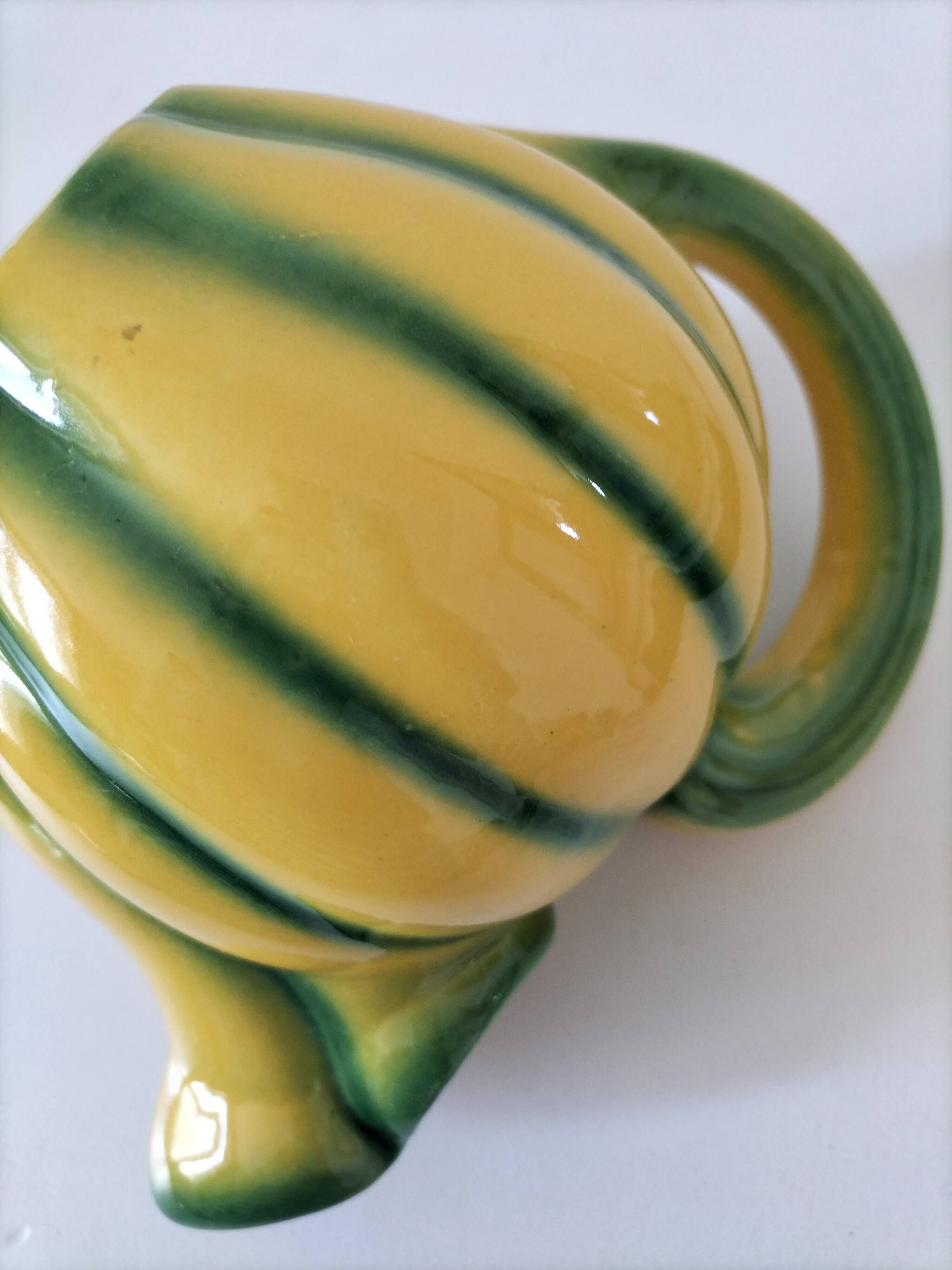 Jug melon in yellow and green majolica