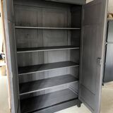 Large black wooden wardrobe