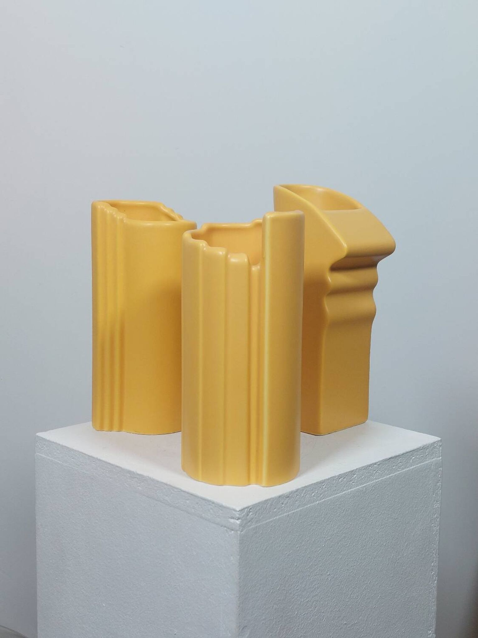 Three yellow vases in Memphis style by ASA Germany.