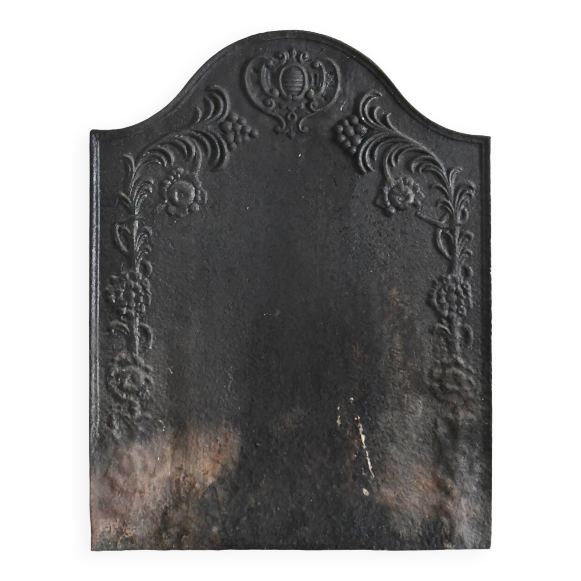 Old cast iron fireplace plaque