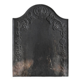Old cast iron fireplace plaque