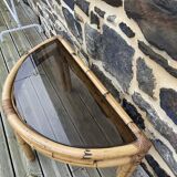 Console / coffee table in rattan and tempered glass.