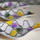 Three vintage free-form ceramic ravine dishes from the 1950s