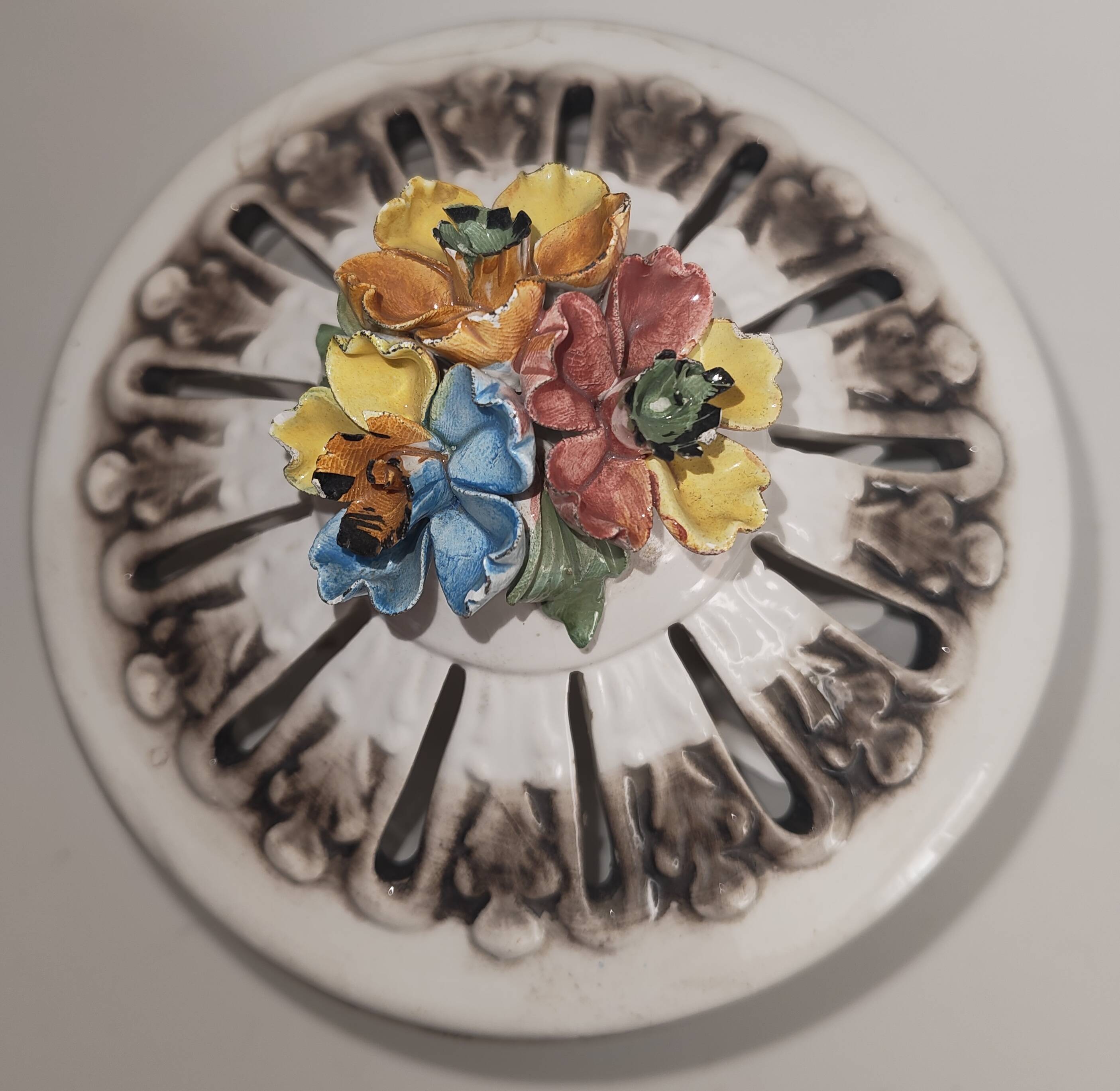 Italian ceramic bonbonnière from Bassano, with raised floral decoration.