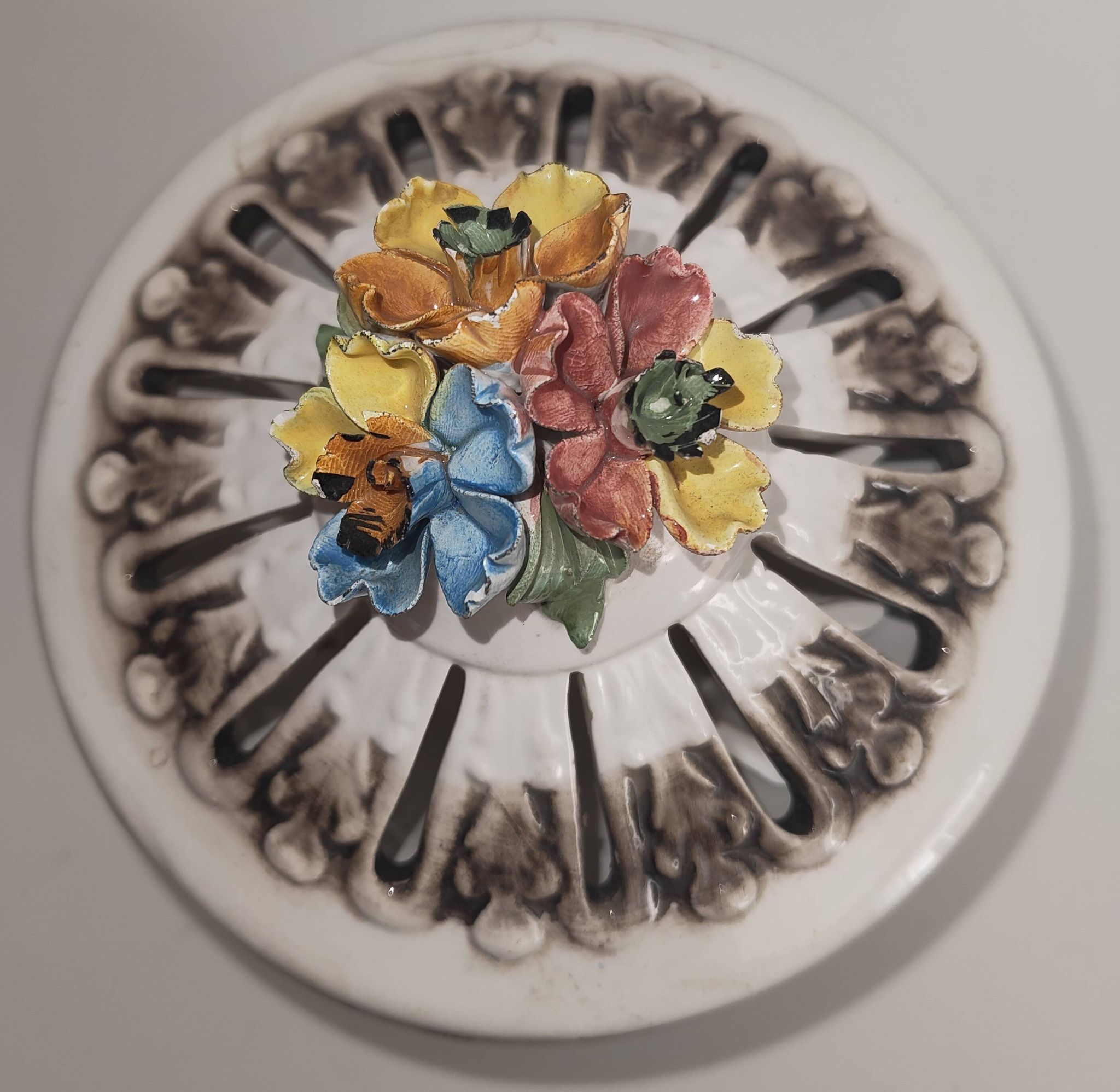 Italian ceramic bonbonnière from Bassano, with raised floral decoration.