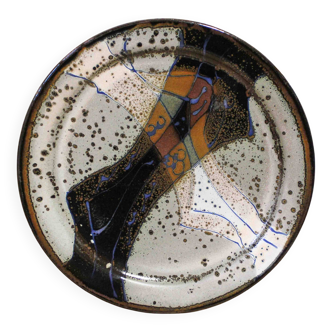 Decorative glazed stoneware plate by Patrick Rollet