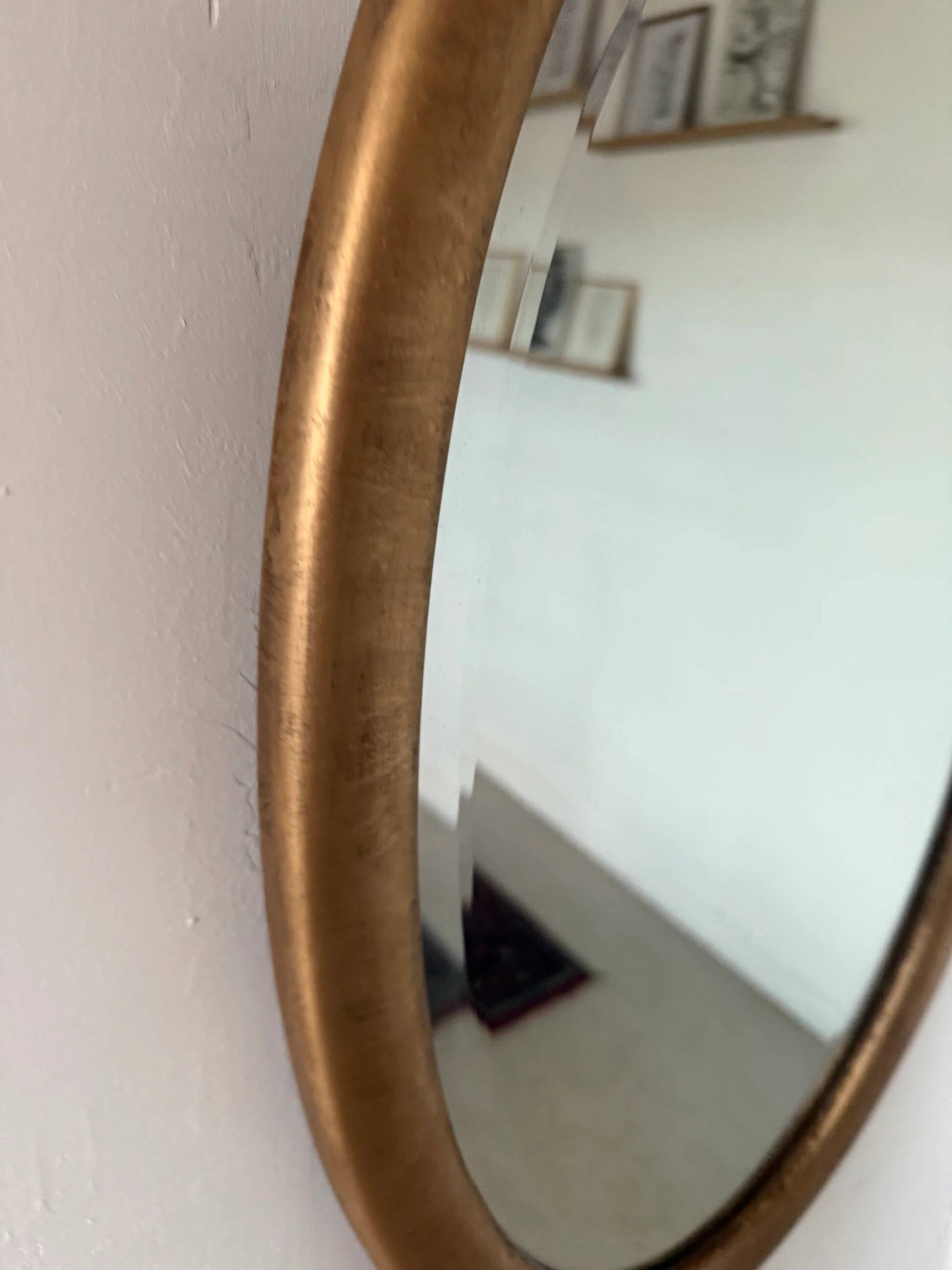 Miroir doré ovale ancien glace biseautée