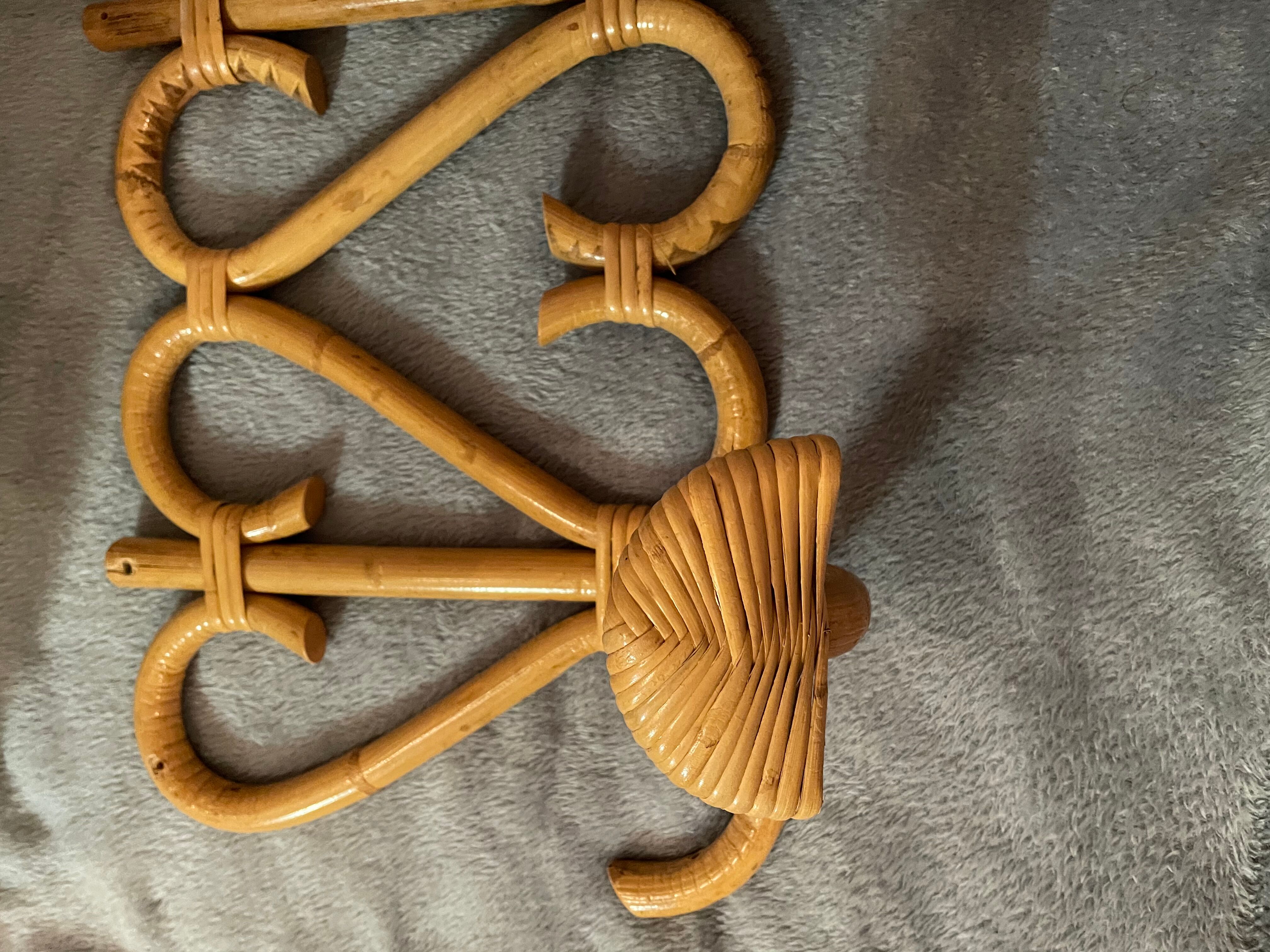 Vintage rattan wall coat holder with 3 pateres